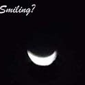 Smiling moon on a rise